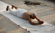 A fasting Nepali Hindu devotee performs the ritualistic roll-around tour of the city on th...