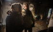 A couple stands in their destroyed apartment in Sumy, Ukraine, after a Russian drone attac...