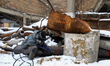 A worker operates a welding machine at Kyiv CHPP-4, which is severely damaged in a massive...