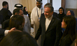 Iranian Foreign Minister Abbas Araghchi talks with participants during the 17th Al Jazeera...