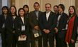 Iranian Foreign Minister Abbas Araghchi poses for a photo with participants during the 17t...
