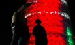 People visit a light installation on the first day of the Llum BCN festival in Barcelona,...