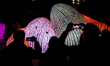 People visit a light installation on the first day of the Llum BCN festival in Barcelona,...