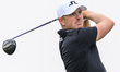 Matt Wallace of England tees off on the 6th hole during the third round of the Qatar Maste...