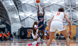 TINA NJIKE (10) of the Penn Quakers attempts a three-point field goal during an NCAA women...