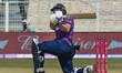 A Scotland batter is in action during a match against Italy at Eden Gardens Cricket Ground...