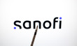 The Sanofi logo appears on a laptop computer screen in this photo illustration in Athens,...
