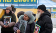 Activists hold portraits of servicemen during the ''Don't be silent! Captivity kills'' ral...