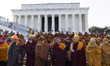 Buddhist monks stand in front of the Lincoln Memorial in Washington, DC, on February 11, 2...