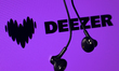 The Deezer logo appears on the screen and a headset in this photo illustration in Ontario,...