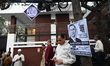 Supporters and activists gather in front of the Bangladesh Nationalist Party's chairman Ta...