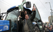 Greek farmers drive their tractors in front of the Greek Parliament to protest over delaye...