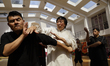 Chiu Chi Ling (white), Kung Fu master and actor, conducts a multi-hour seminar at a sports...