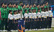 Pakistan's team players stand for the national anthem before the start of the India vs Pak...