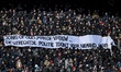 Fans of Feyenoord hold a banner during the match SC Feyenoord Rotterdam vs Go Ahead Eagles...