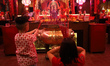 Indonesian Chinese celebrate Chinese New Year by praying at the Hok Tek Bio Temple or Dhan...