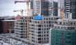 New apartment buildings are under construction in the revitalized post-shipyard Young City...