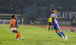 Layvin Kurzawa (right) dribbles the ball during the Persib Bandung vs Ratchaburi match in...
