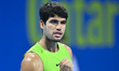 Carlos Alcaraz of Spain celebrates after winning against Valentin Royer of France in the R...