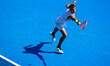Flavio Cobolli of Italy reaches for a ball against Coleman Wong of Hong Kong during their...