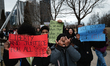 Students from Intrinsic Downtown Campus stop classes to protest in the streets of Chicago,...