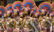 Central Reserve Police Force (CRPF) personnel march in ceremonial formation during a parad...