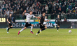 Rafal Adamski of Legia Warszawa and Nemanja Mijuskovic of Wisla Plock are seen during the...