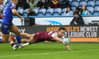 Connor Carr dives for a loose ball during the BetFred Super League match between Huddersfi...