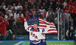 Team USA celebrates the victory during the Winter Olympic Games at the Milano Santagiulia...
