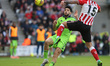 Omar Alderete of Sunderland competes with Raul Jimenez of Fulham during the Premier League...