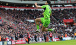 Raul Jimenez celebrates after scoring Fulham's first goal during the Premier League match...