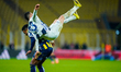 Emre Tasdemir of Kasimpasa SK is in action with Anthony Musaba of Fenerbahce during the Tr...