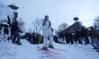 Young New Yorkers in Central Park, Manhattan, jump in the snow in New York City, USA, on F...