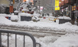 Snow falls in Times Square in Manhattan as blizzard conditions persist for a second day in...
