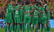 Atletico Nacional players participate in the match between Independiente Santa Fe and Atle...