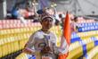 An Indian cricket fan wearing headgear cheers for the team during an India ICC Men's T20 W...