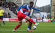 Mike Fondop of Oldham Athletic battles for possession during the Sky Bet League 2 match be...