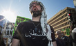 Protesters gather on the streets surrounding the White House in Washington, D.C., on Febru...