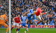 Murillo of Nottingham Forest battles with Danny Welbeck of Brighton during the Premier Lea...