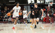 Adonis Ratliff runs down the court, dribbling the ball during the CHSAA 1/4 Finals match b...