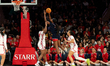 Serah Williams #22 of the UConn Huskies shoots near the basket against the St. John's Red...
