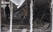 A worker works at the Gandhi Hospital, which is damaged after U.S.-Israeli strikes on a st...