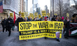 Demonstrators march to Trump Tower in New York City, USA, on March 2, 2026, denouncing the...