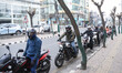 Motorists queue with their vehicles at the Nepal Police petrol pump in Kathmandu, Nepal, o...