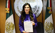 The Speaker of the Mexican Chamber of Deputies, Kenia Lopez Rabadan, shows the Electoral R...