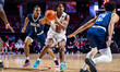 Jordan Mason, 32, of the Temple Owls drives the ball during an NCAA men's basketball game...
