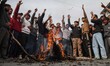 Shiite Muslims burn effigies representing U.S. President Donald Trump and Israeli Prime Mi...