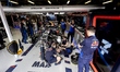 Mechanics work on the car of Formula 1 driver Max Verstappen of Oracle Red Bull Racing dur...