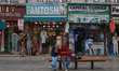Kashmiri girls sit on a bench at a market in Srinagar, Jammu and Kashmir, on March 7, 2026...