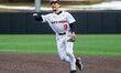 JOEY ERACE, age 9, of the Rutgers Scarlet Knights throws the ball during an NCAA baseball...